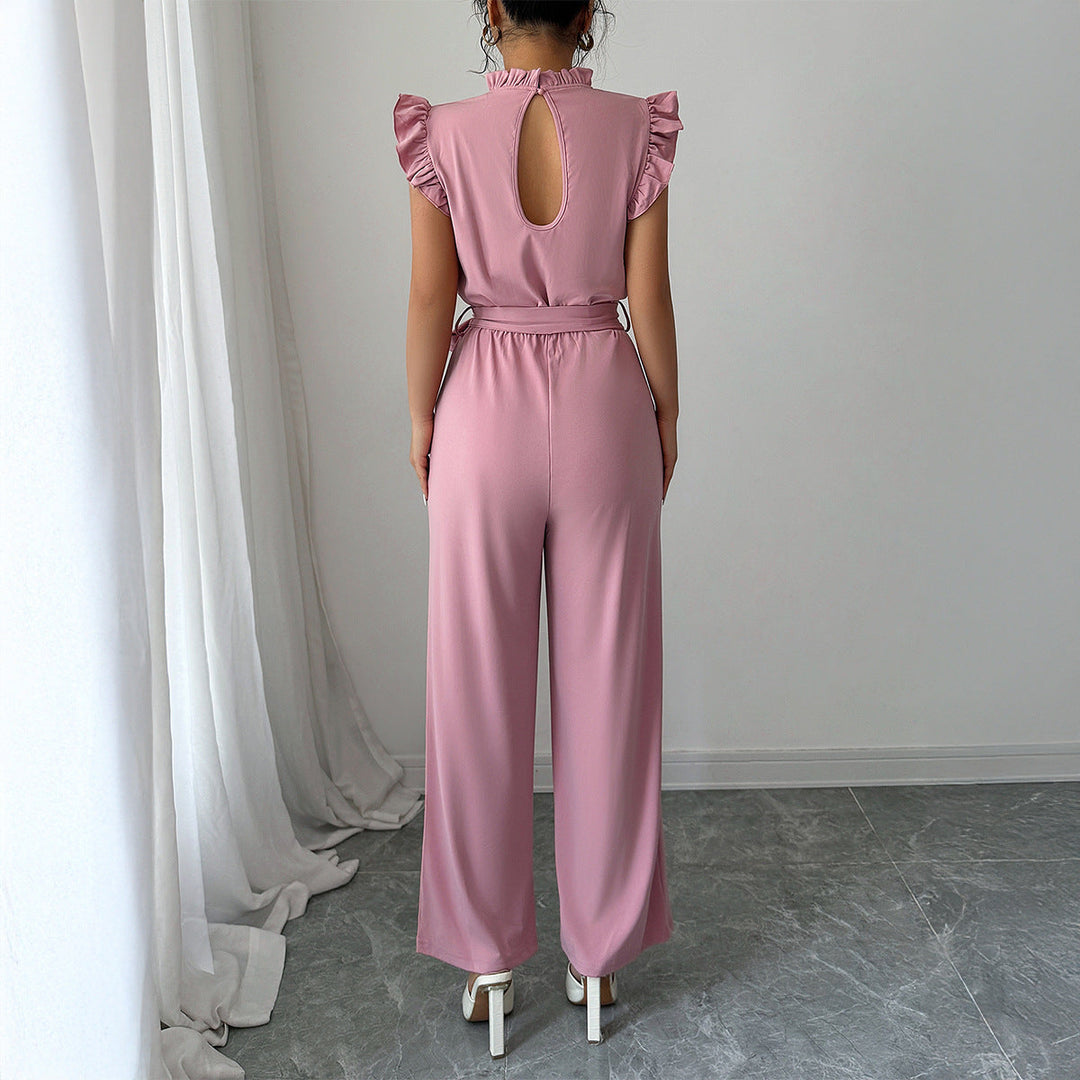 Snygg rosa jumpsuit med rynkor för damer, designad med en bekväm passform och en elegant ryggöppning.