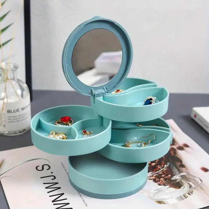 "Elegant roterande smyckesskrin med flera lager, spegel och LED-belysning för smidig och lyxig smyckesförvaring."