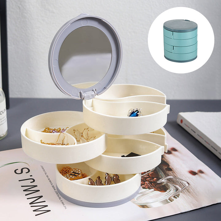 "Elegant roterande smyckesskrin med flera lager, spegel och LED-belysning för smidig och lyxig smyckesförvaring."