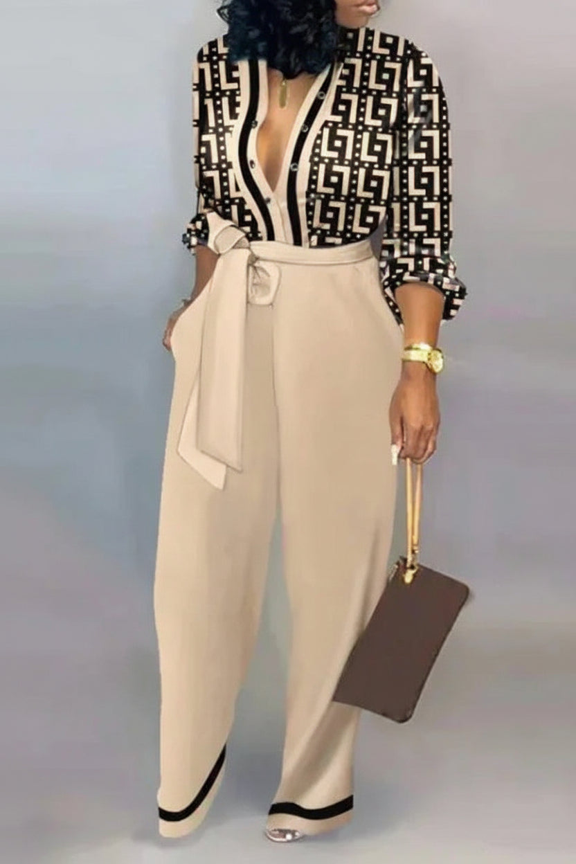 Skräddarsydd byxdress för dam med hög midja och chic midjesnörning. Bekväm & elegant passform.