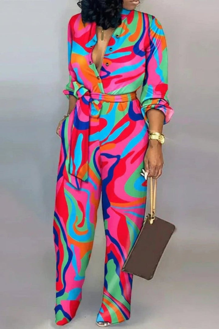 Chic skräddarsydd dam byxdress Ava i helfigur. Elegant med hög midja och vida ben för stilrena tillfällen.