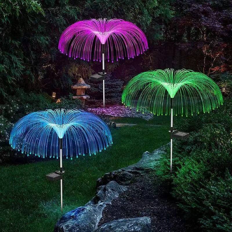"Elegant solcellslampa för trädgården, färgbyte, vädertålig IP65-design, sju färger för unik nattatmosfär. 92x35 cm."