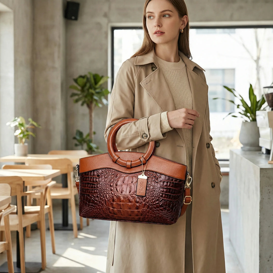 Elegant strukturerad Leah handväska för kvinnor med topphandtag. Stilren och praktisk vardagsväska.