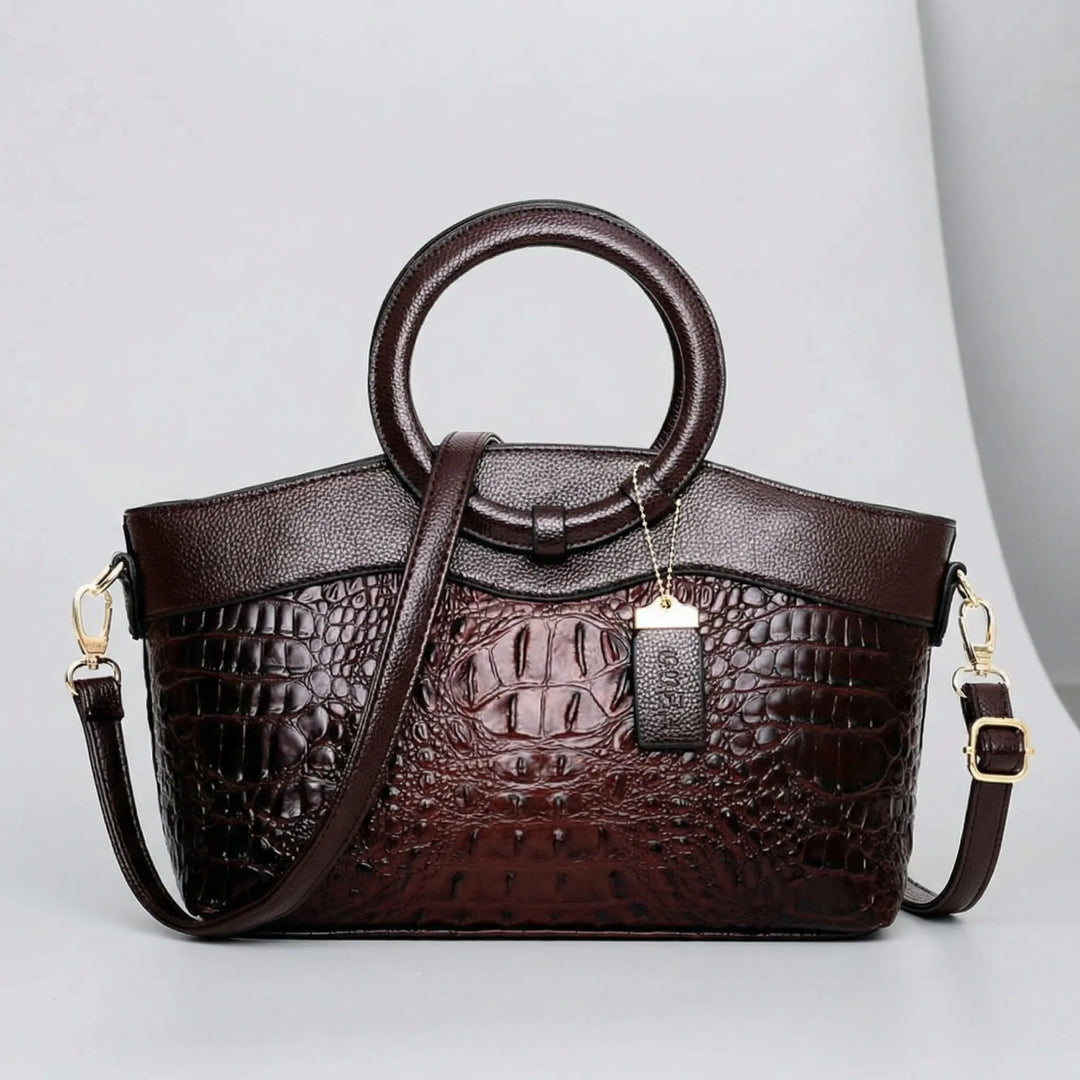 Kvinnors Leah axelväska/crossbodyväska, strukturerad design i elegant stil. Organiserad och funktionell.