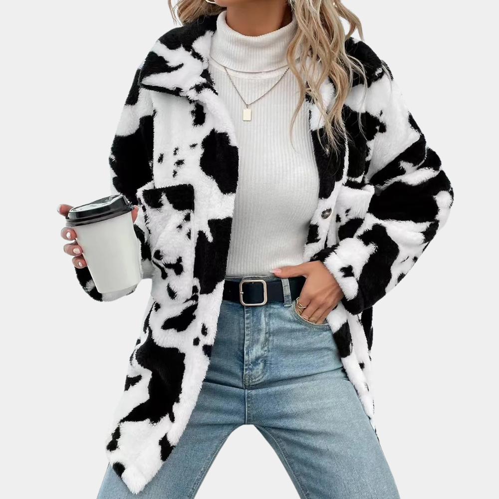 Bekväm brun damjacka i stilren design, ett varmt ytterplagg som skyddar mot kylan under vintern.
