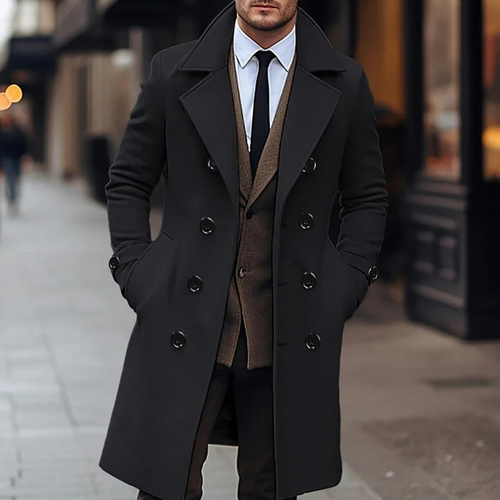 Elegant svart herrkappa, klassisk peacoat för vinterbruk, varmt ytterplagg. Mode för herrar i tidlös stil.