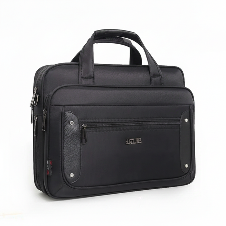 Praktisk unisex laptopväska för arbete och resor, med flera fack för organiserad förvaring av dator och tillbehör.
