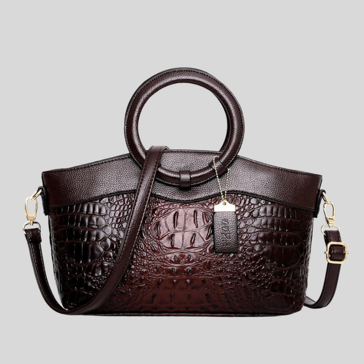 Mångsidig Leah strukturerad axelväska. Elegant design, perfekt som handväska eller crossbody för damer.
