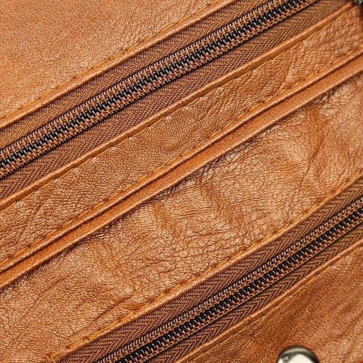 Högkvalitativ damväska i messenger-stil, svart. Perfekt som vardags- eller jobbväska, elegant design.