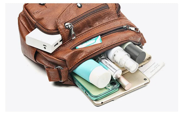 Svart handväska i messenger-stil för damer. Rymlig och elegant design, mångsidig accessoar.