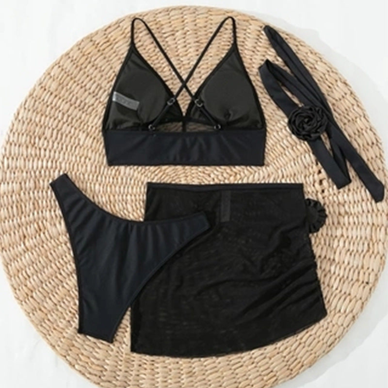 Förföriskt elegant svart transparent lingerieset för damer; en topp och kjol med vackra detaljer.