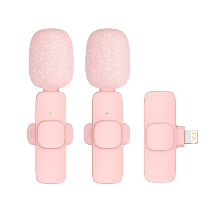 Elegant trådlös lavalier-mikrofon i rosa för mobil, levererar kristallklart ljud och omnidirektionell ljudupptagning för kreativa projekt.