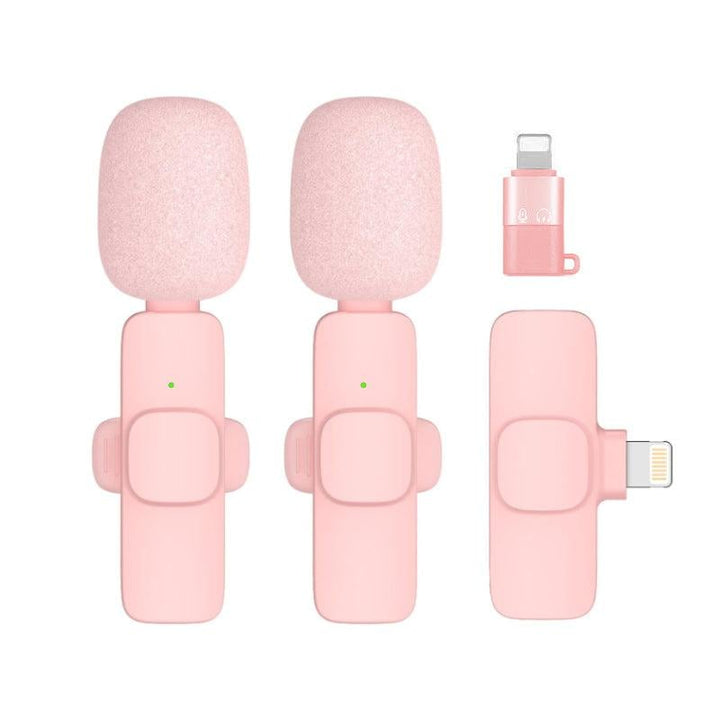Elegant trådlös lavalier-mikrofon i rosa för mobil, levererar kristallklart ljud och omnidirektionell ljudupptagning för kreativa projekt.