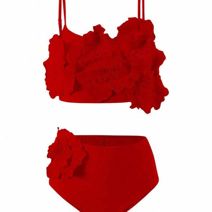 Vacker tvådelad bikini för dam med detaljerat blommönster och bekväm hög midja. Perfekt för badkläder.