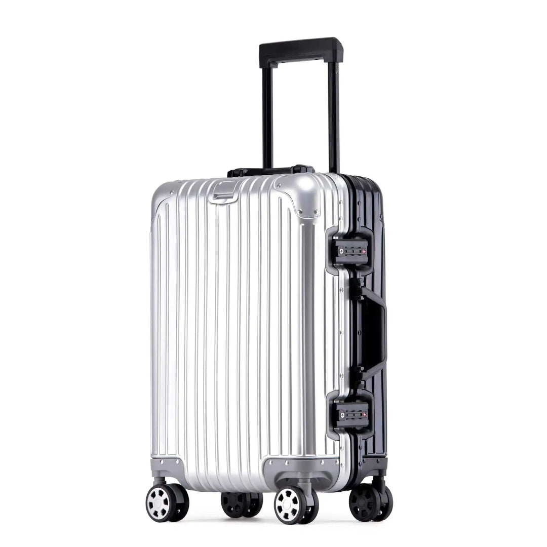 Lyxig unisex resväska i silverfärgad aluminium. Hårdskal, spinnerhjul, idealisk för stiliga resor.