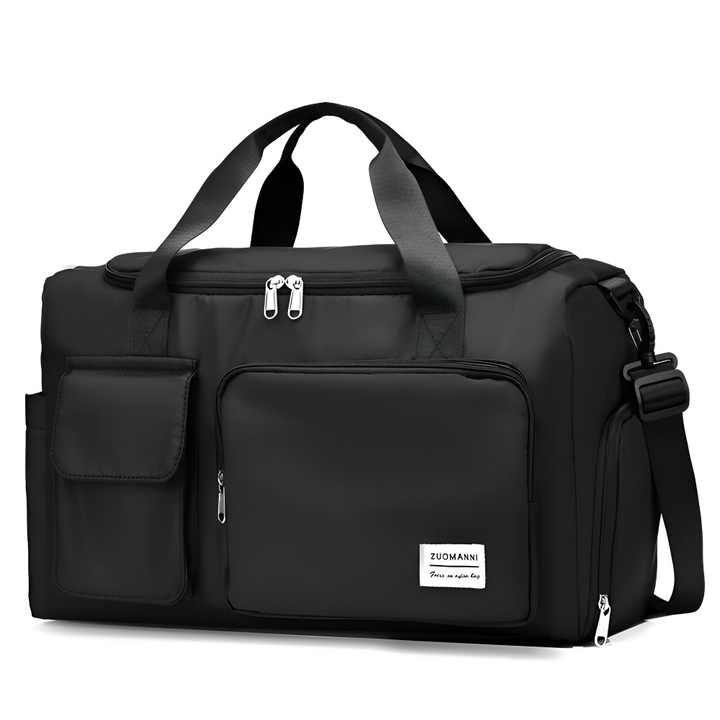 Stilren duffelväska stående på golv, en robust och elegant resebag.