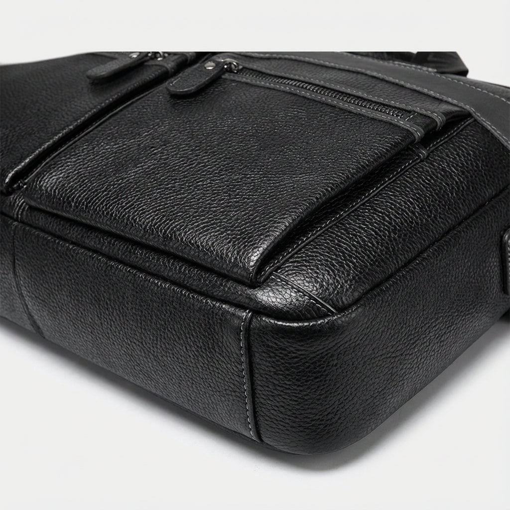 UrbanSling läderlaptoptas för säker transport av din dator. Elegant datorväska med axelrem.