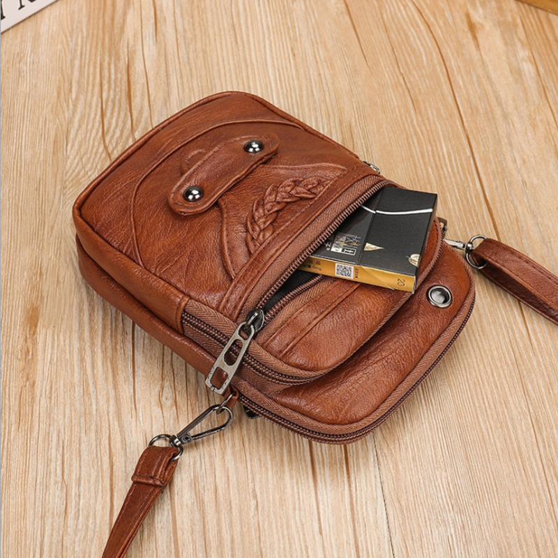 Vintage mini crossbody-väska i PU-läder, brun och kompakt, perfekt för kvinnor som söker stil och funktion.