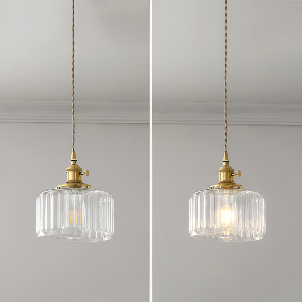 Vintage takbelysning: grön cylindrisk pendellampa med elegant design.