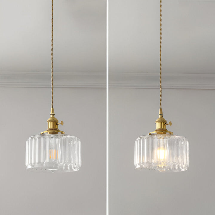 Vintage takbelysning: grön cylindrisk pendellampa med elegant design.