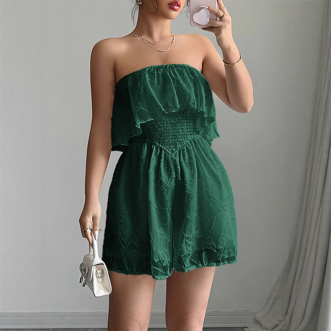 Svart bandeau jumpsuit för damer med elegant design och volangdetaljer, passar kvällsoutfit och fest.