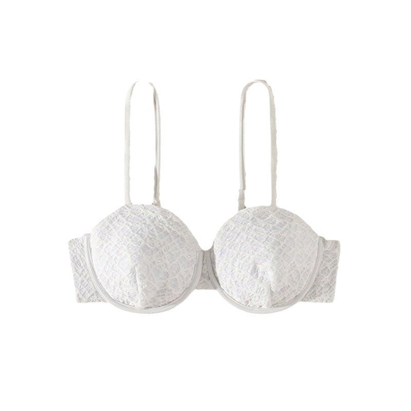 Elegant och bekväm dam push-up BH. Vit spetsstruktur som ger bysten ett vackert lyft och feminin känsla.