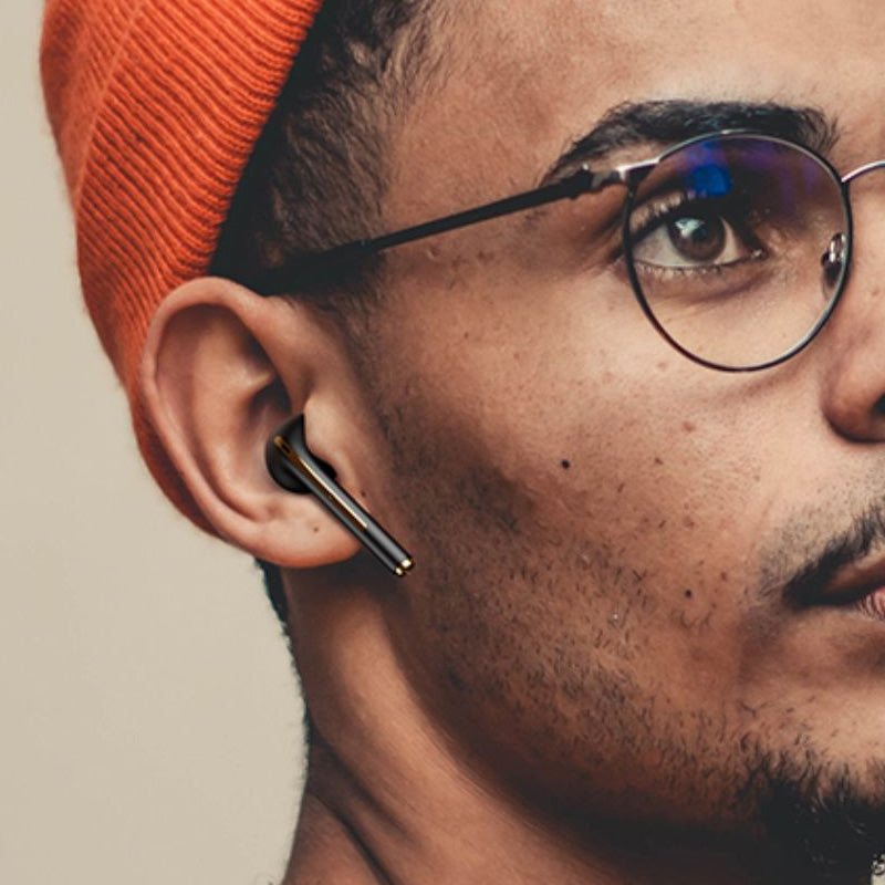 "Eleganta in-ear trådlösa Bluetooth-hörlurar i olika färger, med högkvalitativt ljud och bekväm passform för musikälskare."