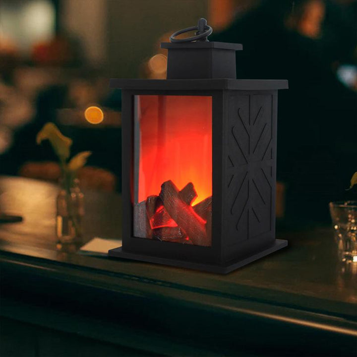 "Eleganta LED-flamlampa i metall med realistisk flammeffekt, skapar en varm atmosfär i hemmet, batteridriven och säker."
