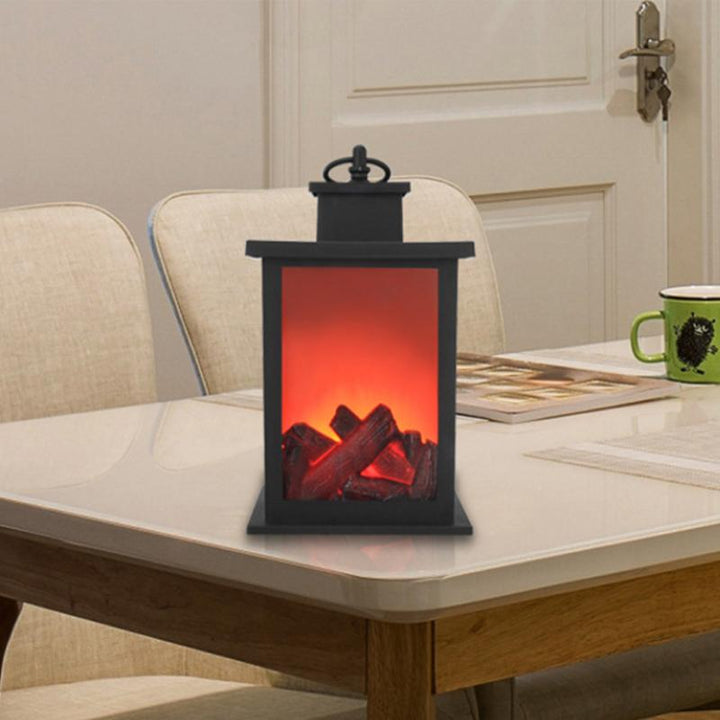 "Eleganta LED-flamlampa i metall med realistisk flammeffekt, skapar en varm atmosfär i hemmet, batteridriven och säker."