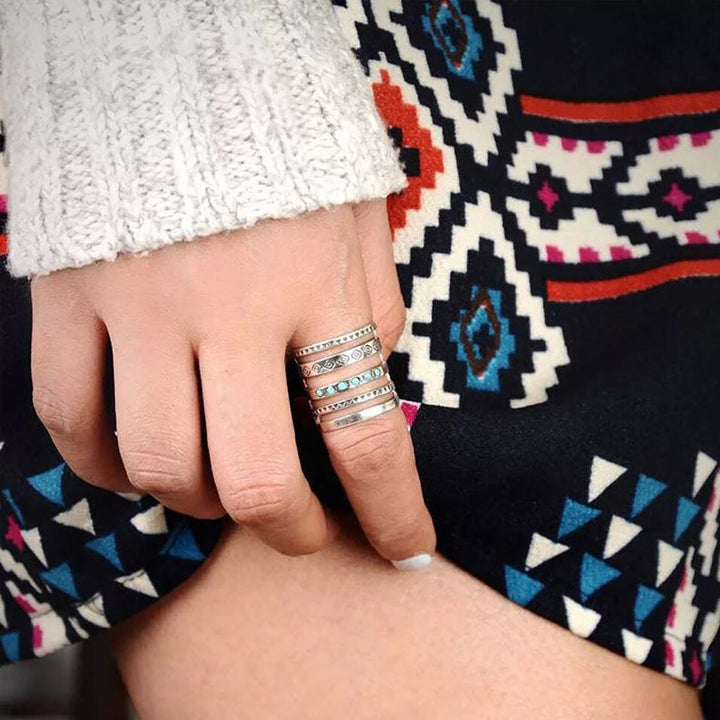 "Eleganta silver damring med stjärna, måne och sol-design, perfekt accessoar med glänsande yta för daglig användning."