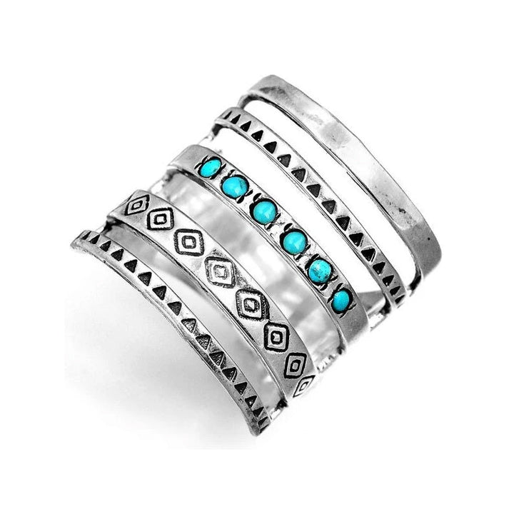 "Eleganta silver damring med stjärna, måne och sol-design, perfekt accessoar med glänsande yta för daglig användning."