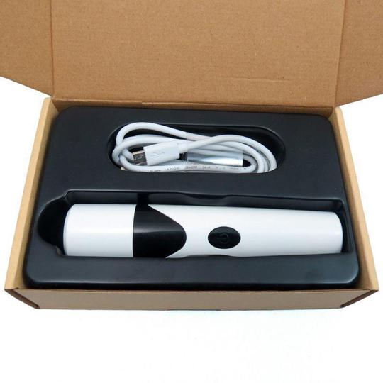 Elektrisk nagelslip för husdjur med USB-laddning, låg ljudnivå; vit enhet på neutral bakgrund.