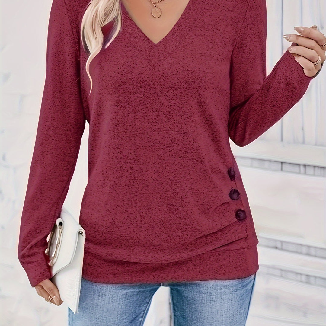 Elegant långärmad dam t-shirt med V-ringning i stilsam design för vardagsmode