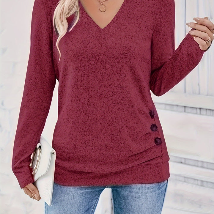 Elegant långärmad dam t-shirt med V-ringning i stilsam design för vardagsmode