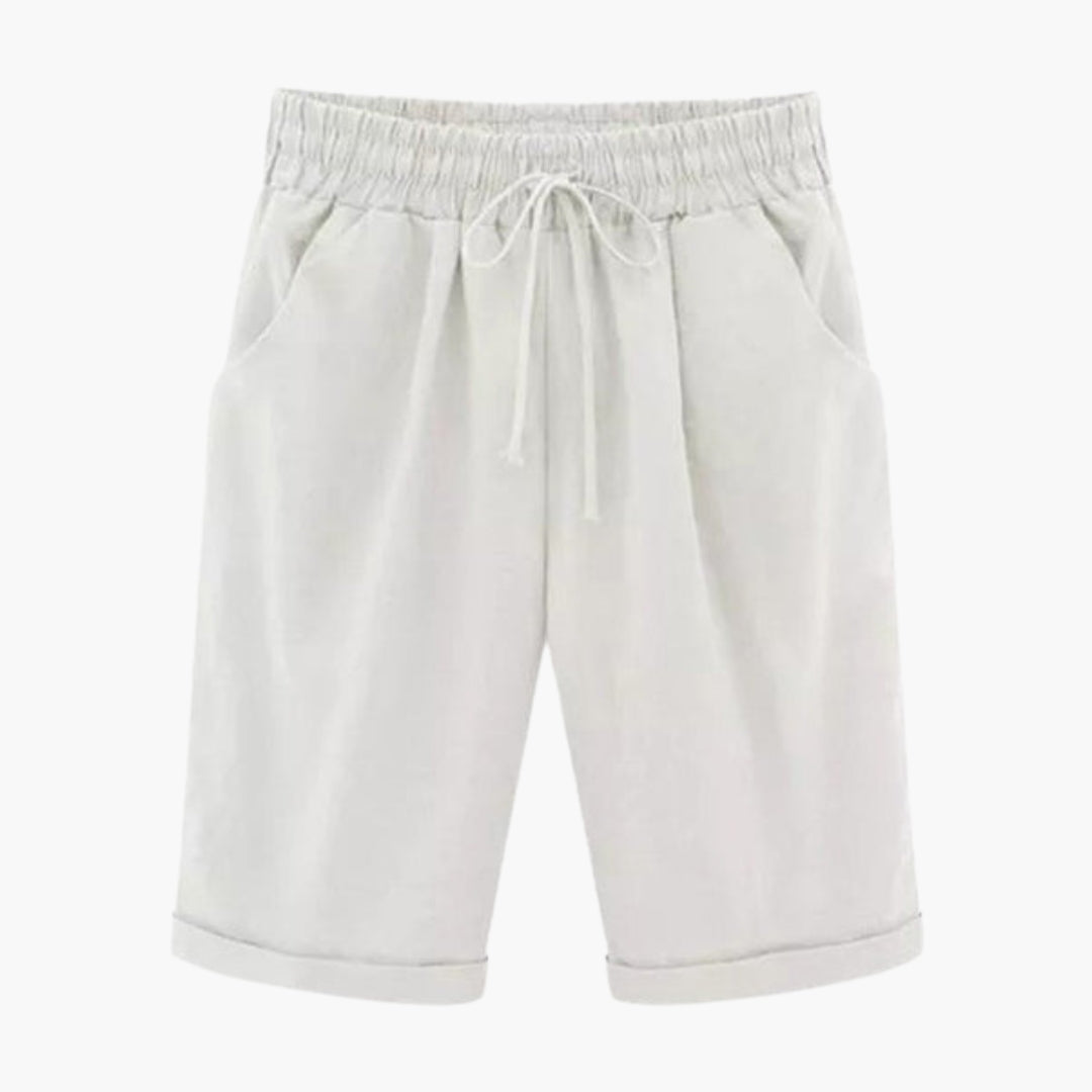 Enfärgade knälånga dambyxor med elastisk midja, fickor. Bekväma vardagsbyxor, perfekta sommarbyxor.