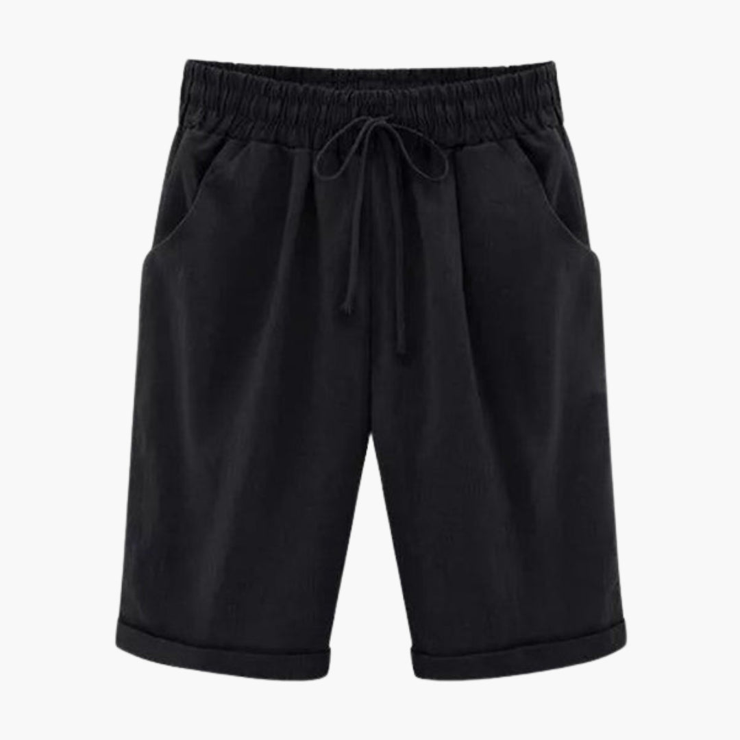 Sommarbyxor: knälånga dambyxor, pull-on design med elastisk midja och praktiska fickor. Enfärgade.