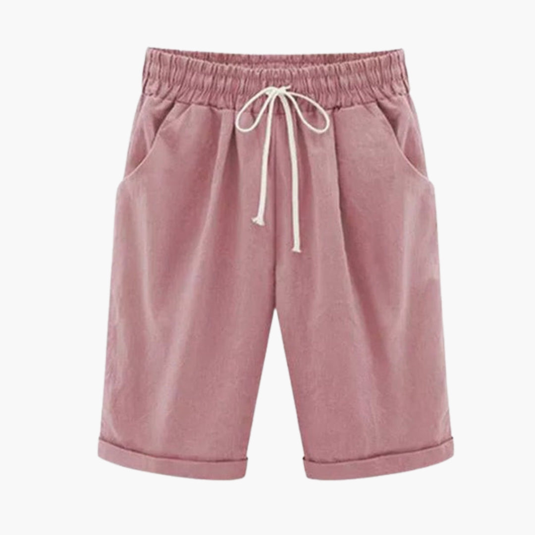 Dambyxor med elastisk midja, knälånga och enfärgade. Bekväma vardagsbyxor med fickor, pull-on.