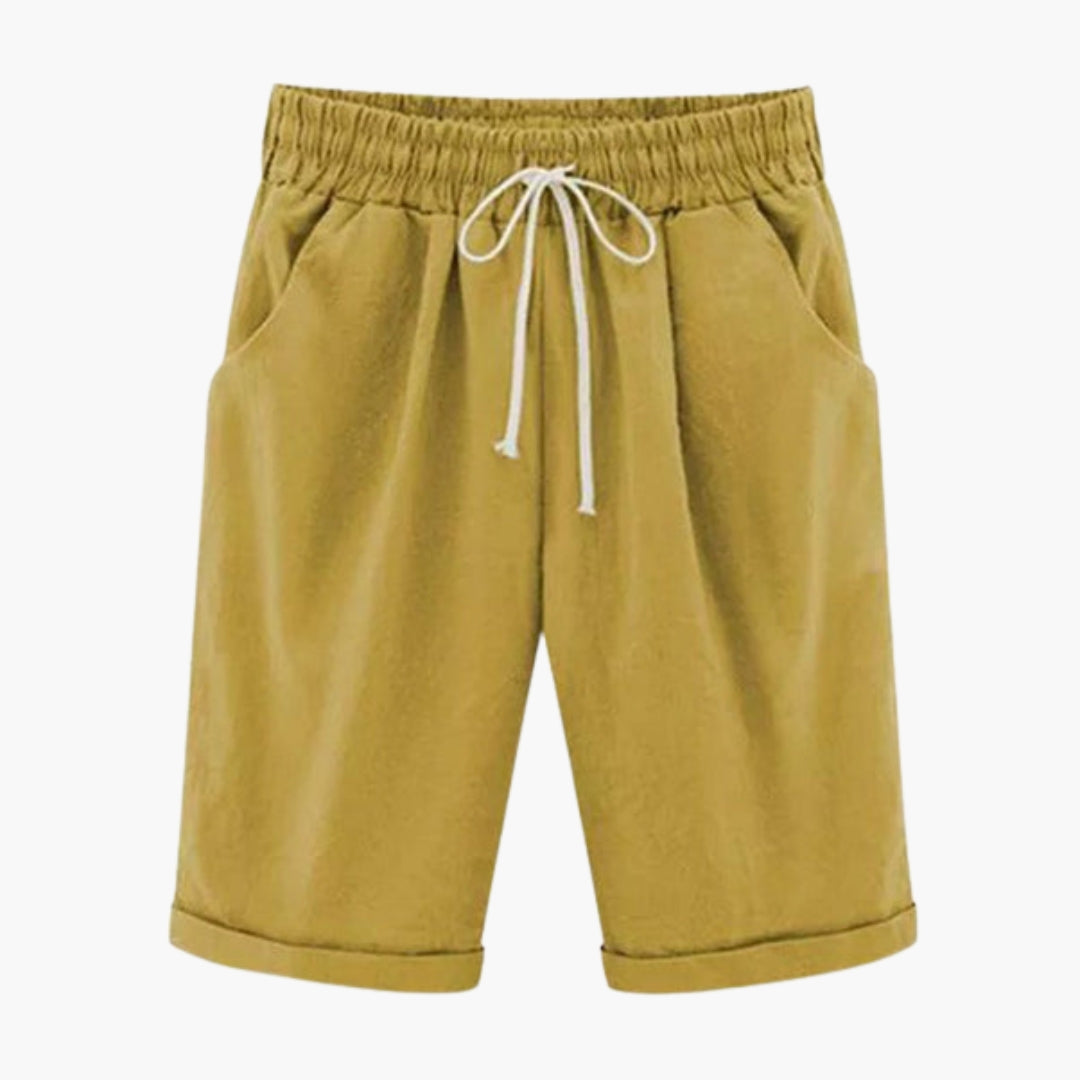 Knälånga dambyxor med skön elastisk midja och fickor. Enfärgade, bekväma pull-on vardagsbyxor.