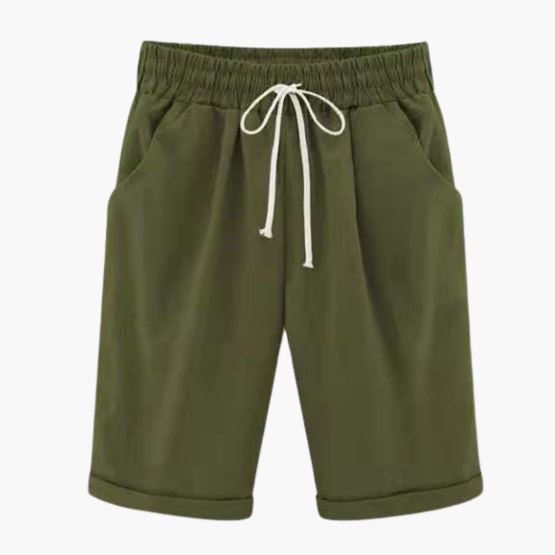 Moderna knälånga dambyxor, enfärgade. Med elastisk midja, fickor och bekväm pull-on design.