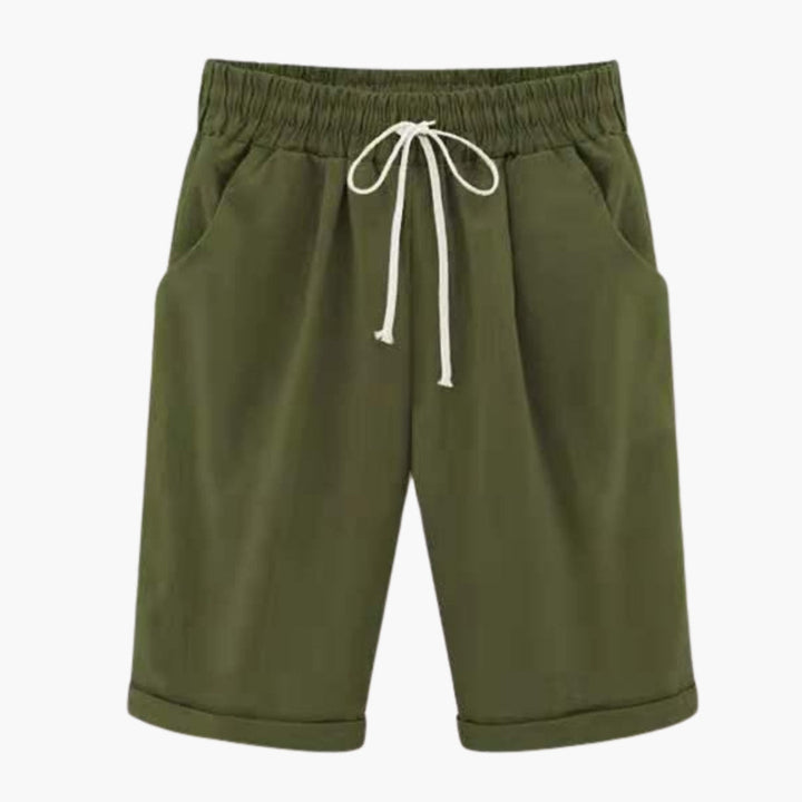 Moderna knälånga dambyxor, enfärgade. Med elastisk midja, fickor och bekväm pull-on design.