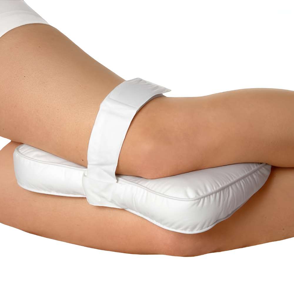 Ergonomisk knäkudde för sidosovare i minnesskum. Smärtfri sömn, avlastar rygg- och höftsmärta.