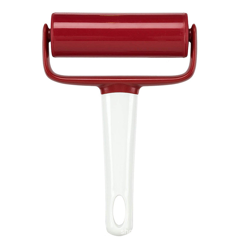 "Ergonomisk tårtglasyr-finisher i vitt, designad för jämna ytor. Perfekt för dekorering av bakverk i hemmakök."