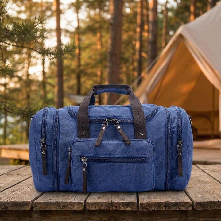 Expanderbar canvas weekendväska WeekenderPro, rymlig unisex duffelväska för smart förvaring på resor.