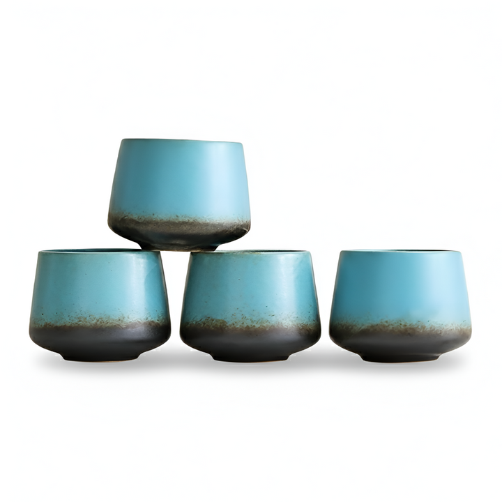 Unik design: handgjorda keramik kaffekoppar i vintage tie-dye. Ett färgstarkt 4-pack för heminredning.