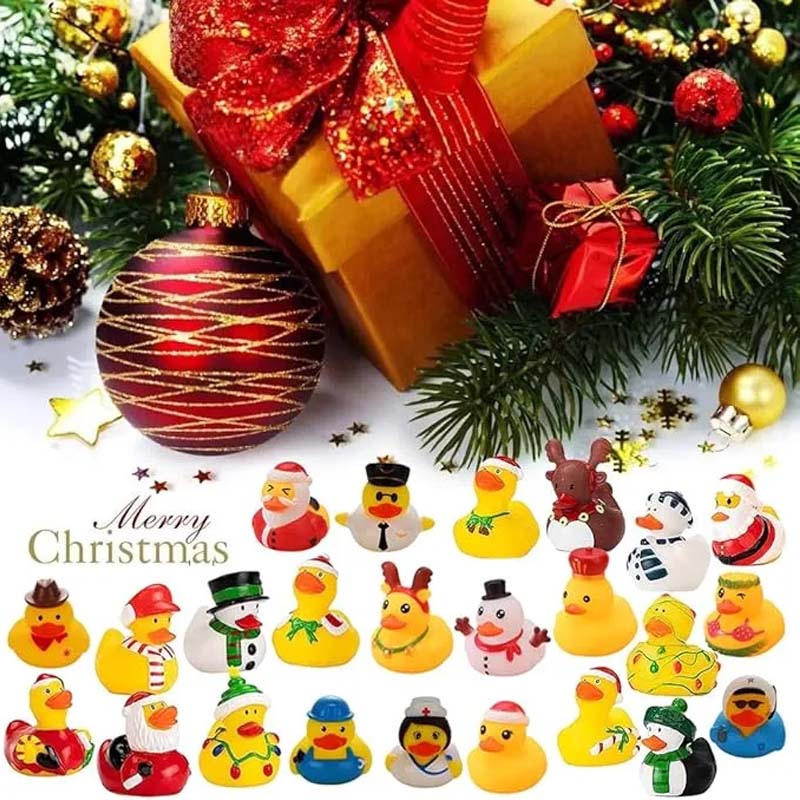 "Färgglad adventskalender med 24 jultema gummiankor för barn, perfekt för julnedräkning och dagliga överraskningar."