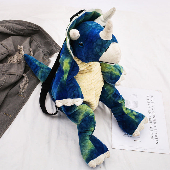"Färgglad barnryggsäck formad som en dinosaurie, justerbar och vattentät med vadderad ryggpanel och meshtyg."