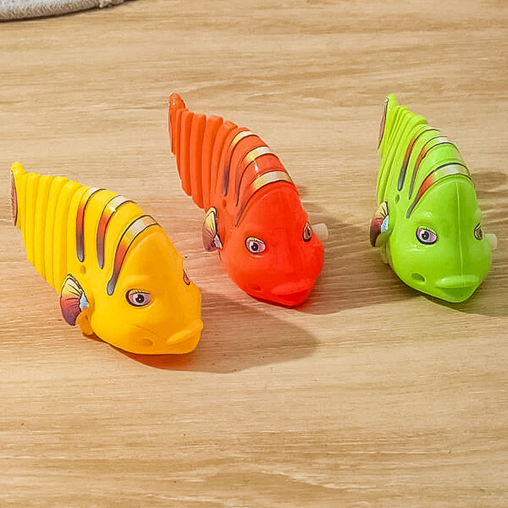 Färgglad fiskleksak för barn med livlig design, 360° rotation och säker plast. Perfekt för kreativ och rolig lek.