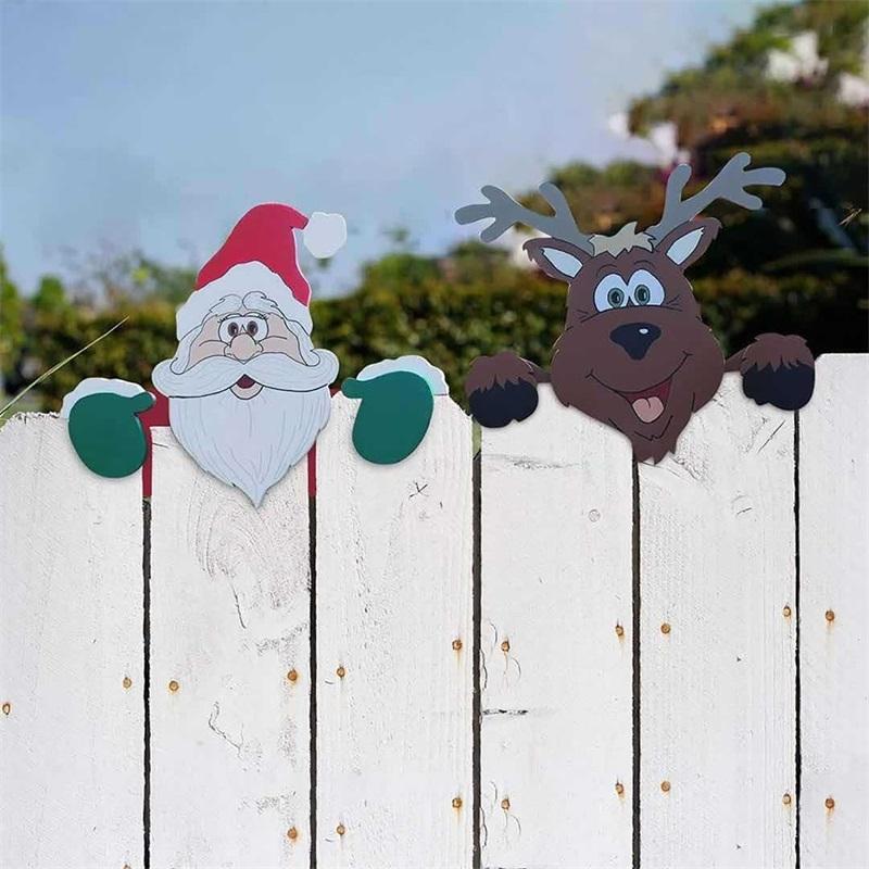 Färgglad julstaketdekoration med älgar och snögubbar för utomhusbruk, ger trädgården festlig julstämning.
