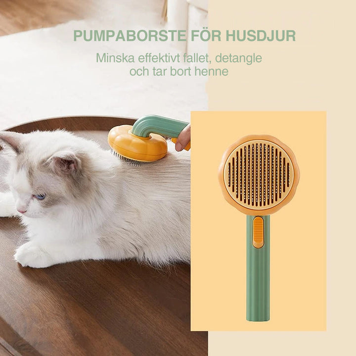 "Färgglad pumpaformad husdjursborste för hundar och katter med ergonomiskt grepp och böjda trådar för djup vård."