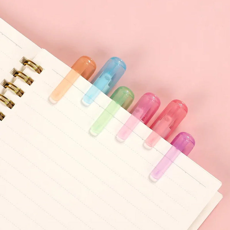 "Färgglada Curve Highlighter Pennor för kreativa projekt med dubbelspetsdesign och flera färger, i plastförpackning."